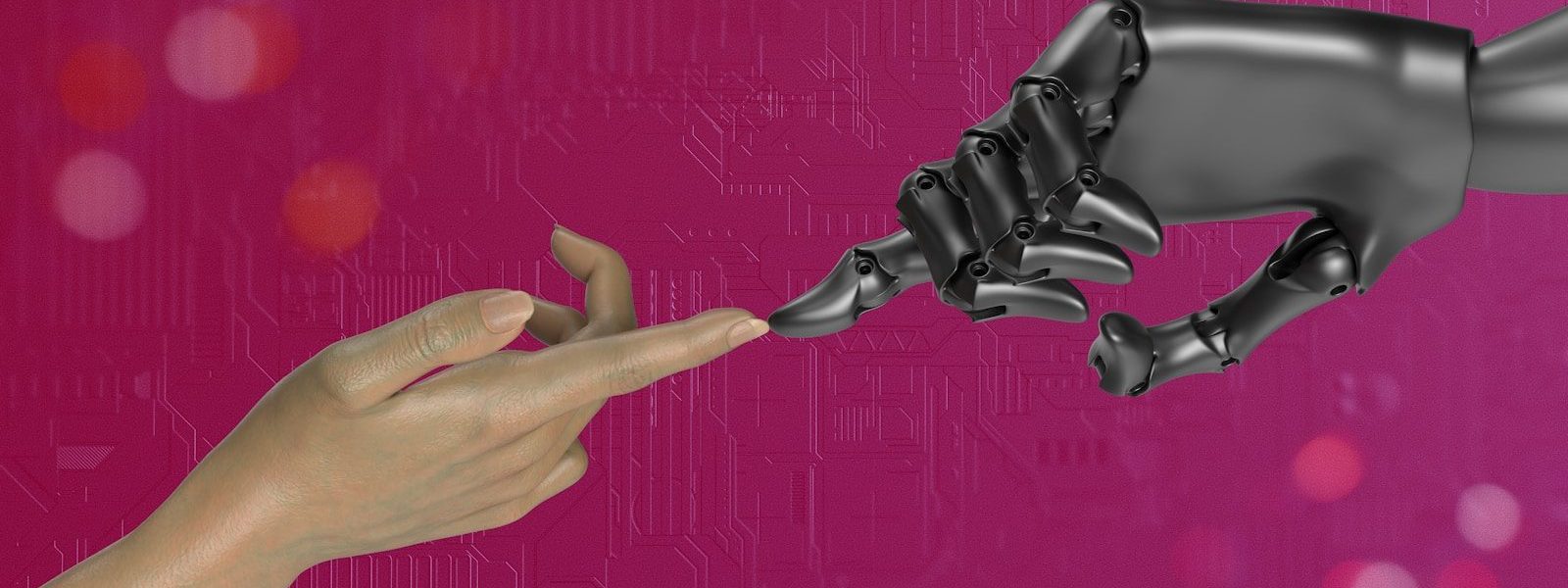 two hands touching each other in front of a pink background
